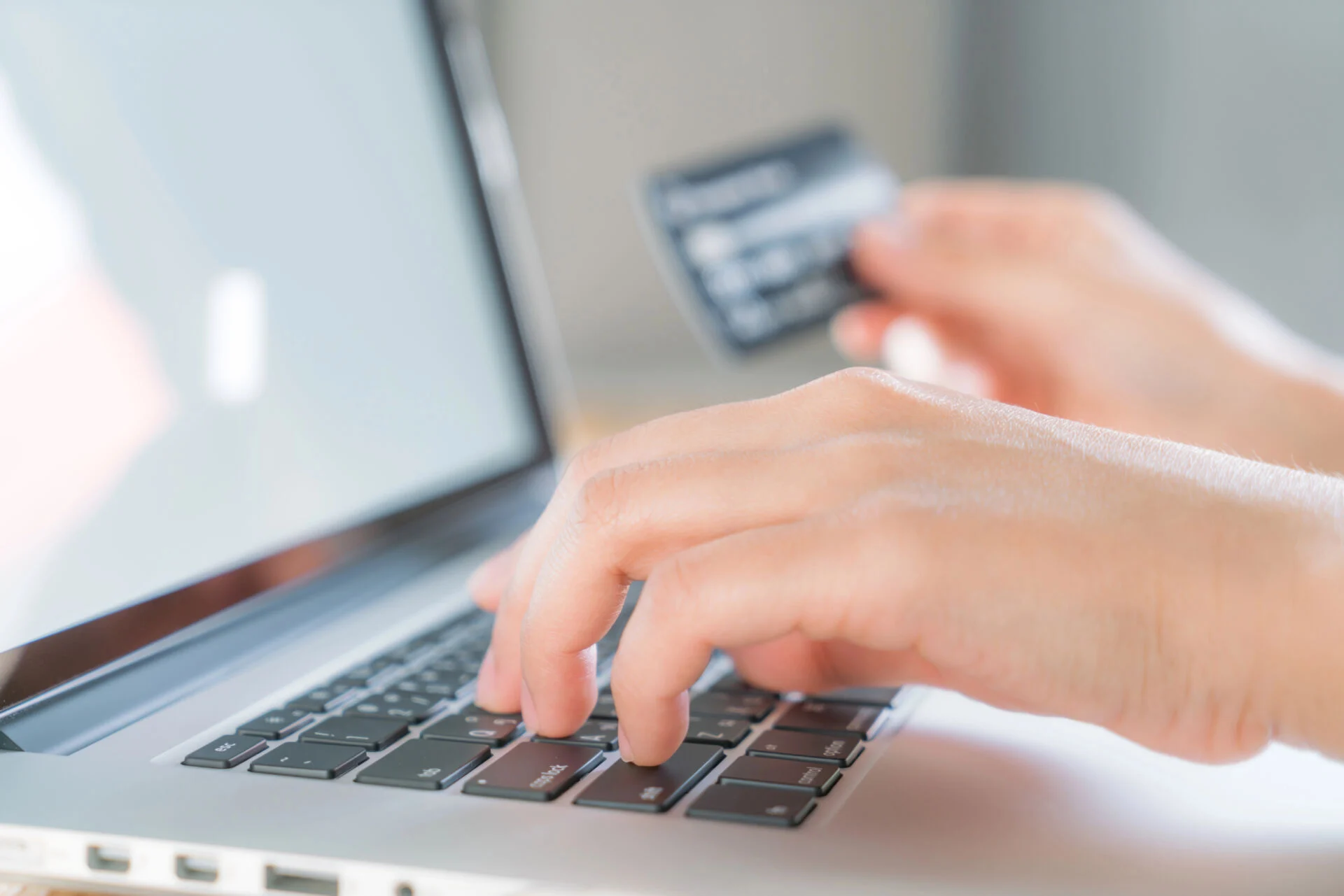 Person making online payment with credit card