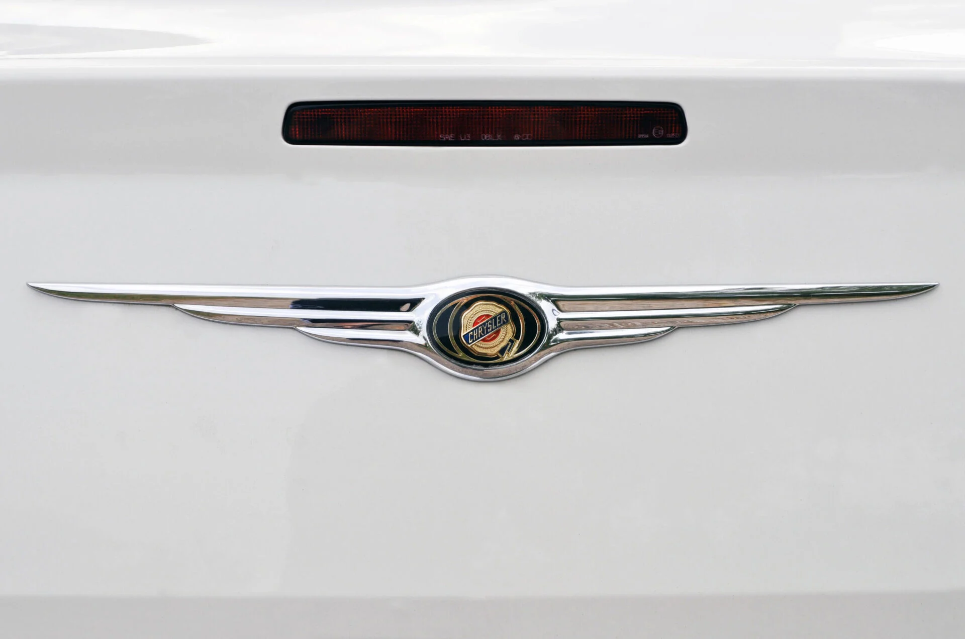 Close up of Chrysler logo on a car