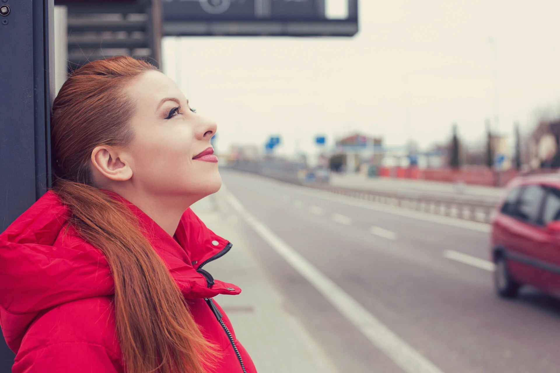 Woman standing outside smiling