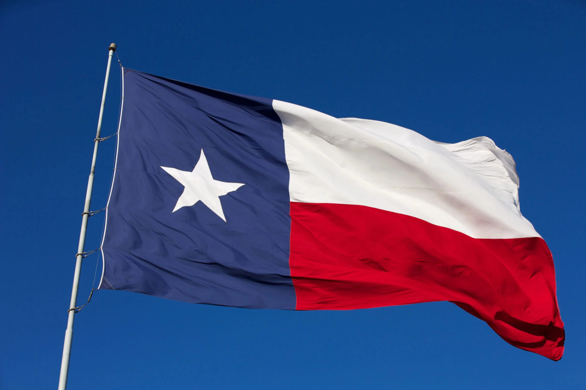 Texas state flag blowing in the wind