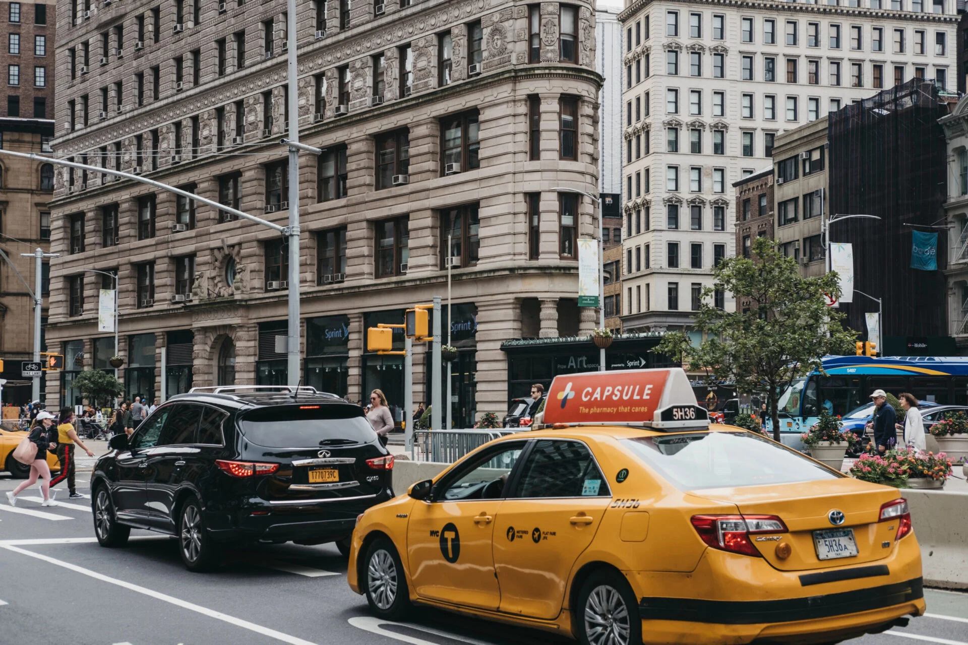 Numerous yellow taxis on the street in New York.