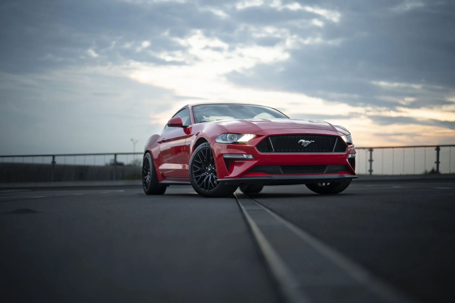 A Ford Mustang GT sports car at sunset