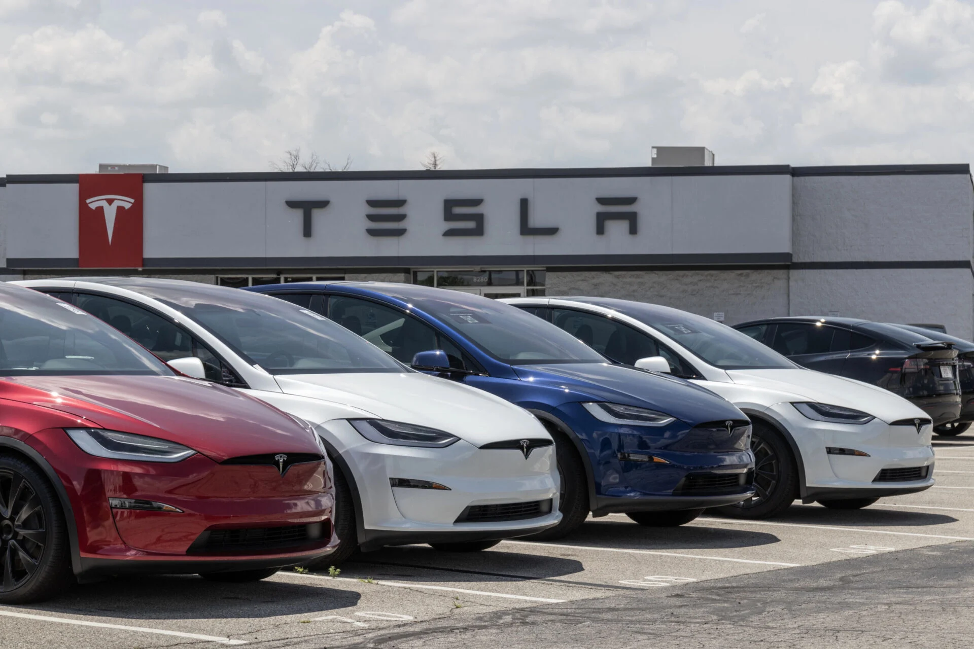 Photo of the car lot at a Tesla dealership