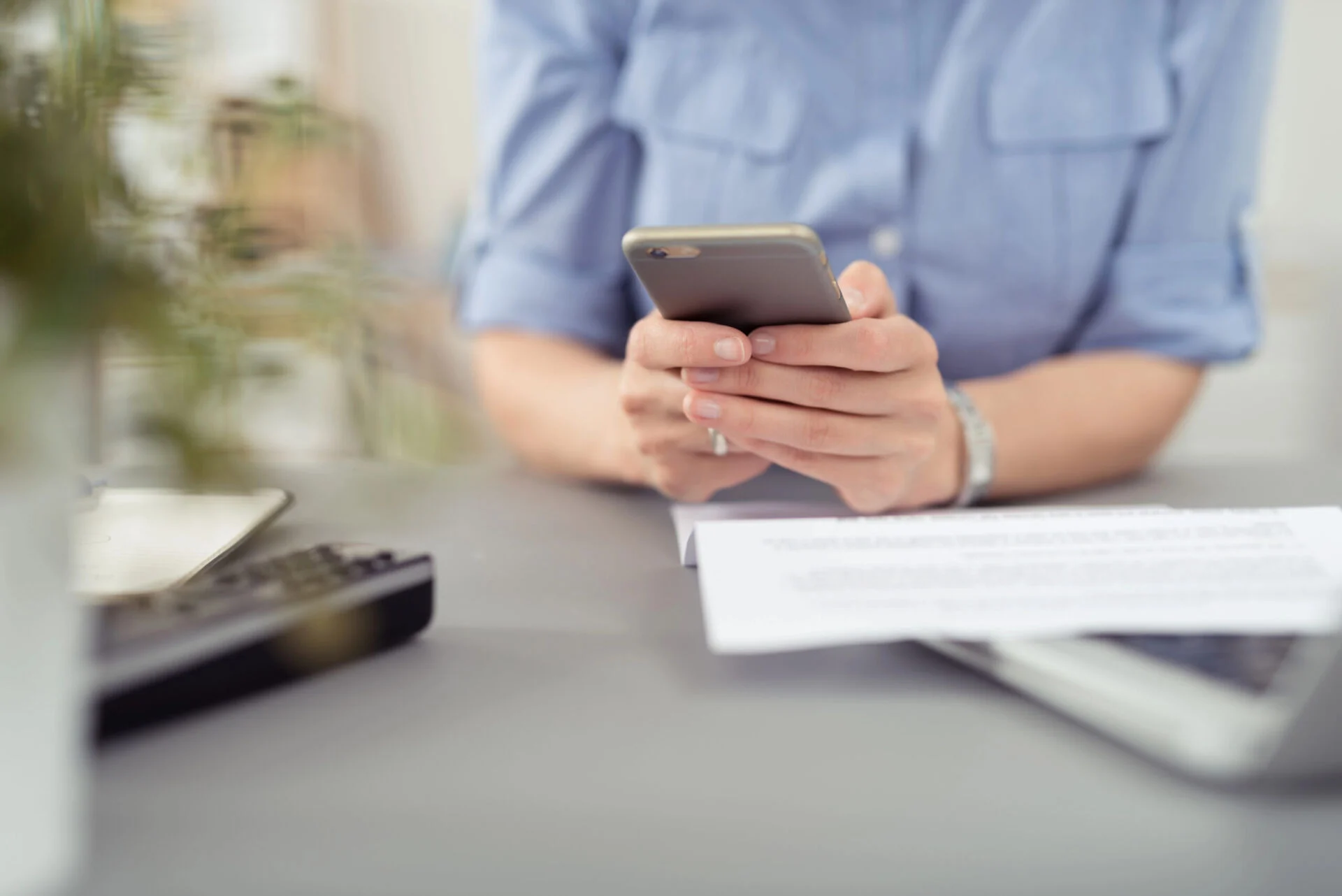 Person holding a cell phone